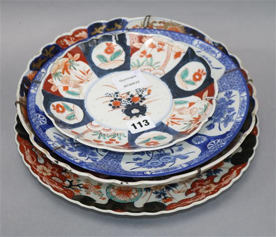 Three Japanese Imari dishes and a blue and white example largest diameter 31cm